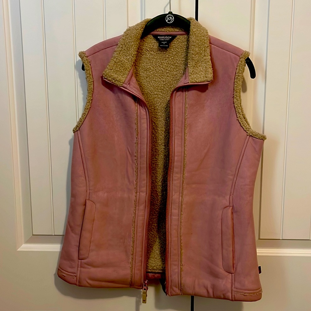 Mauve zip up vest.